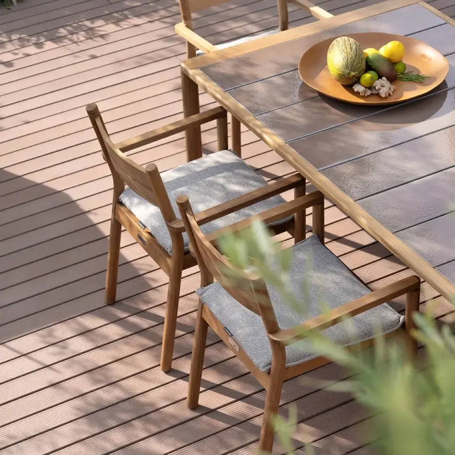 Distinguished Atmosphera Panama armchair with a sculptural timber frame and muted gray woven textile seat and backrest