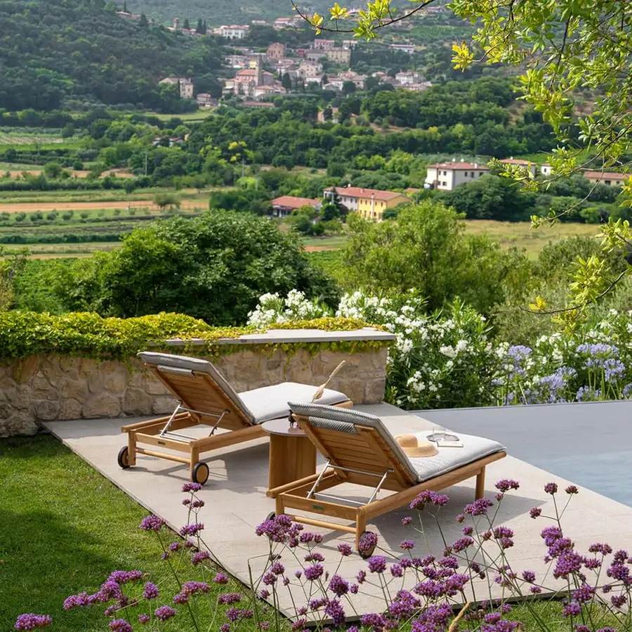 Exceptional Atmosphera Panama lounger crafted with satin teak and neutral gray cushions for relaxed outdoor comfort