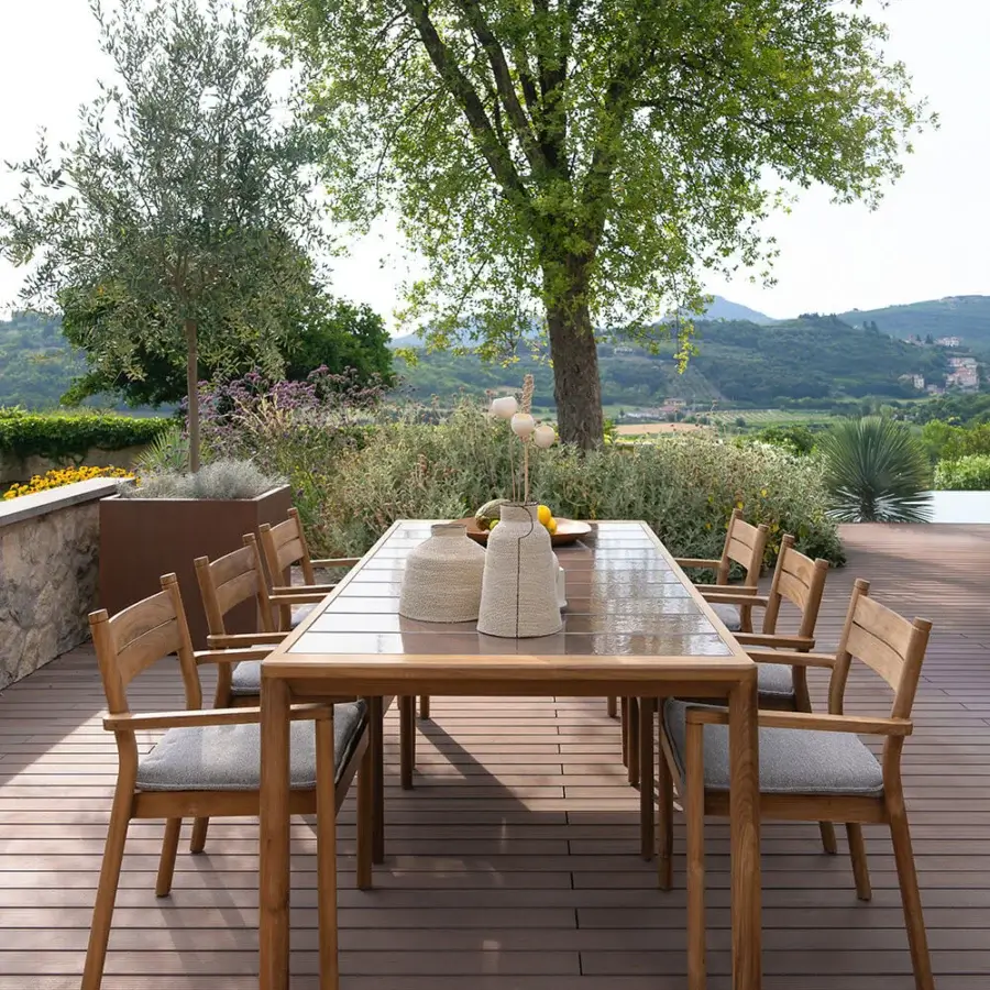 Exceptional Atmosphera Panama table crafted in warm medium-brown teak wood with a durable ceramicized lava stone tabletop and satin finish