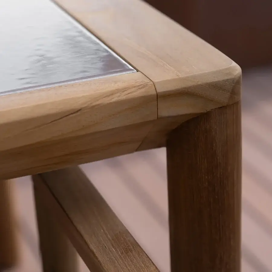 Superior Atmosphera Panama table built with warm brown teak and durable ceramicized lava stone with a satin finish