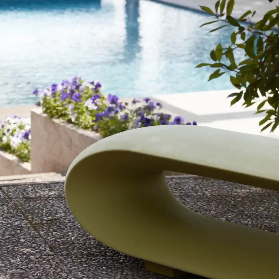 Elegant Serralunga Loop Bench sculpted from LLDPE with a lacquered finish in muted olive green