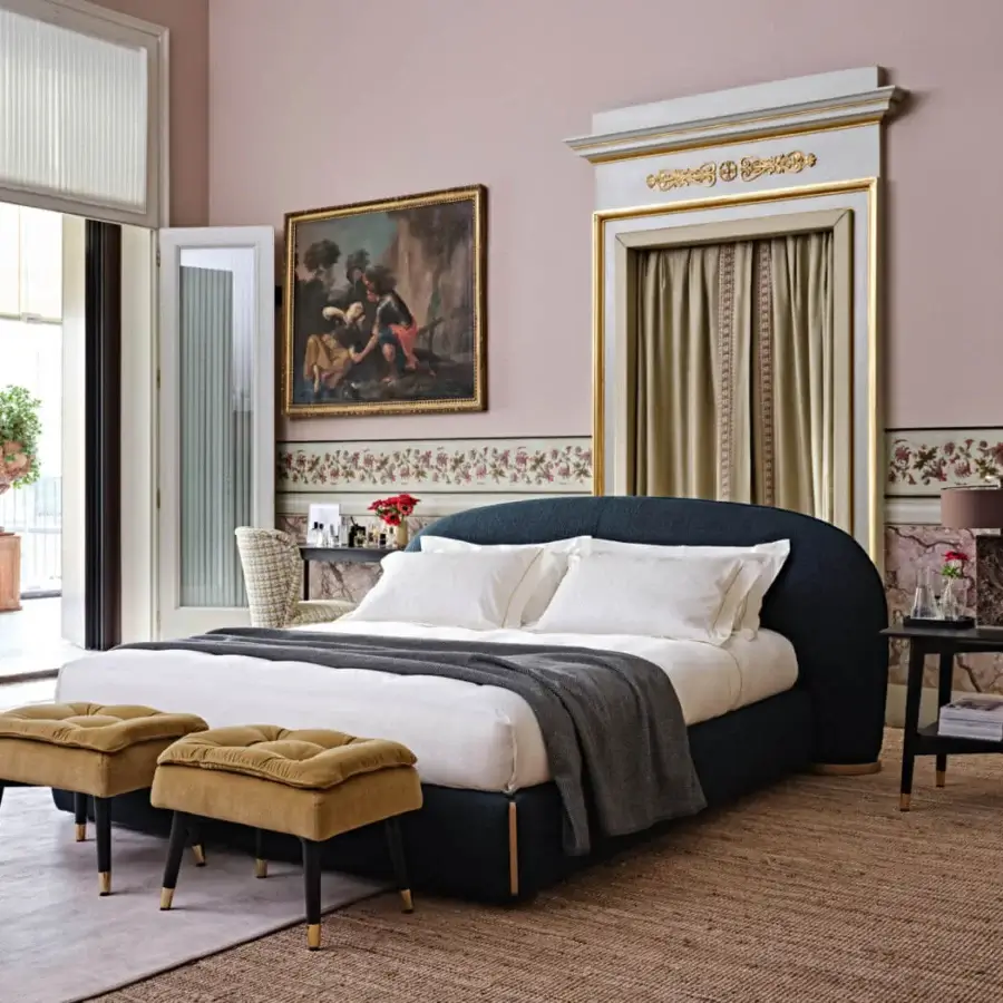 Elegant Black Tie Alfio nightstand crafted in wood with matte black finish and slender metal legs