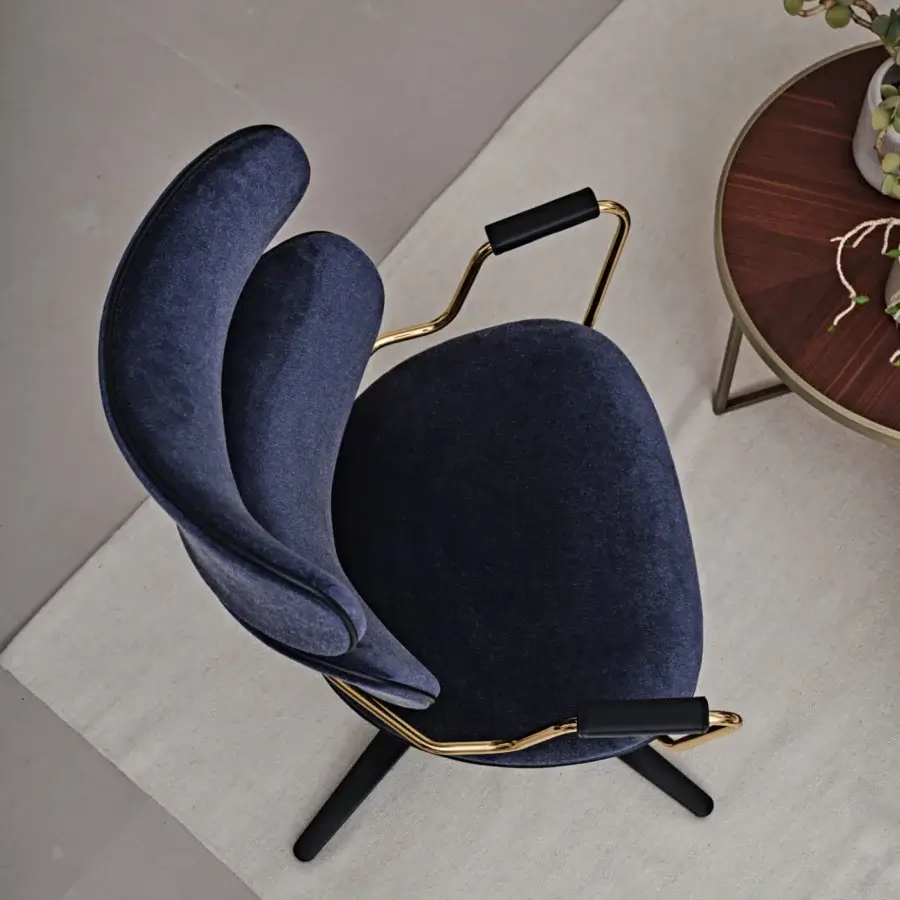 Distinguished Black Tie Asia swivel lounge chair upholstered in dark blue matte textile with a golden metal frame