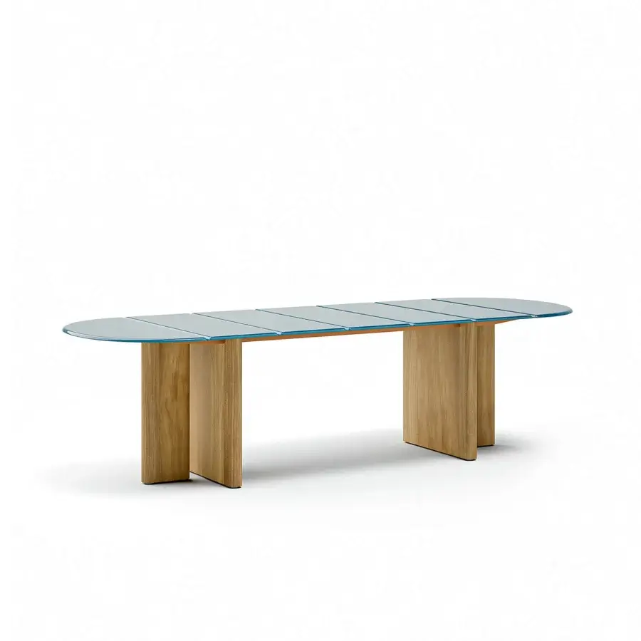 Elegant Atmosphera Materia table with cool blue glass tabletop and solid Asian Teak double bases in satin finish