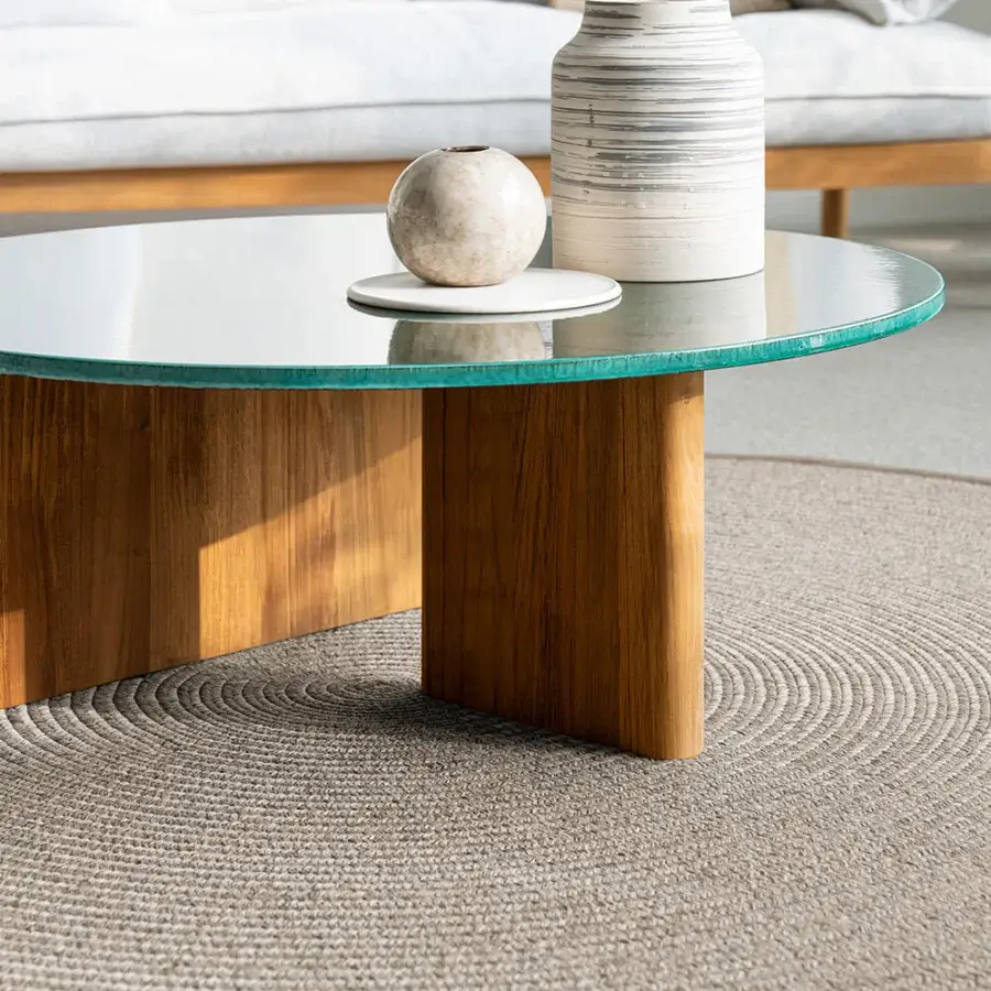Exceptional Atmosphera Materia coffee table crafted with Asian Teak and glossy glazed lava stone exhibiting a rounded form