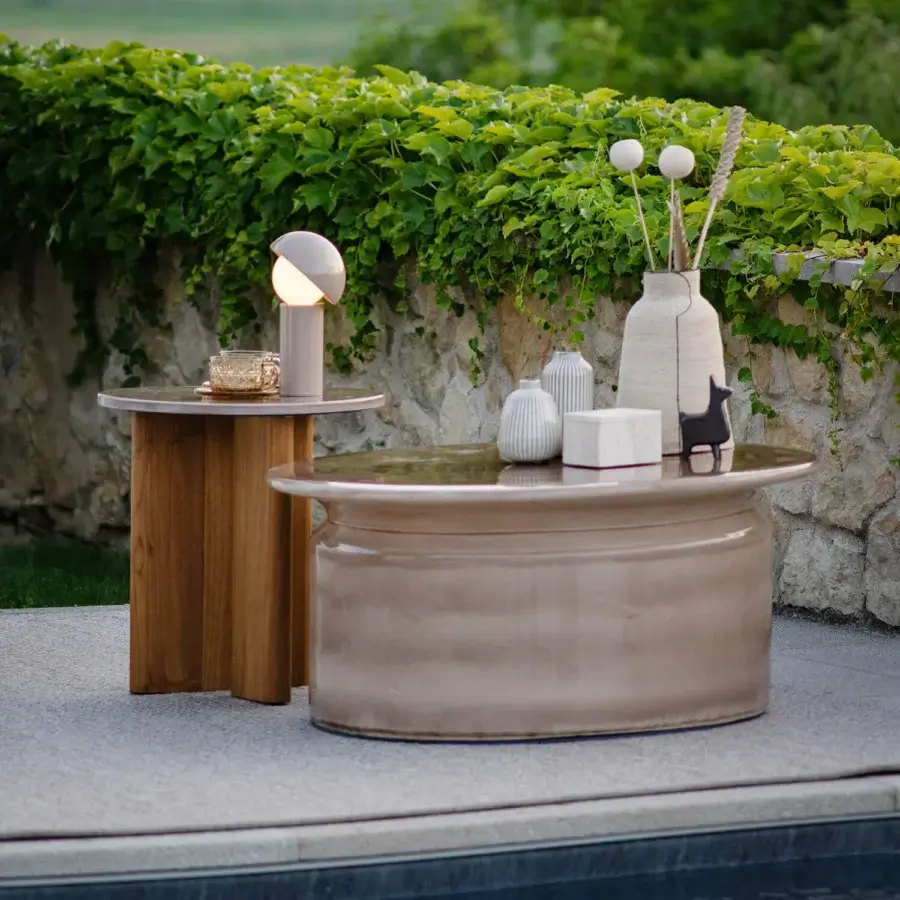 Distinguished Atmosphera Materia side table with sculpted solid Asian Teak base and warm beige-grey glossy glazed lava stone top