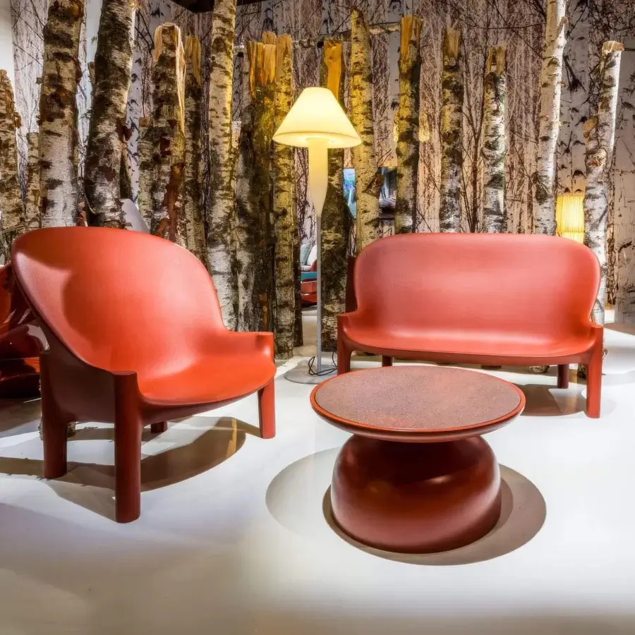 Superior Serralunga Balzac sofa with a distinctive curved form crafted in reddish-orange LLDPE with a matte finish