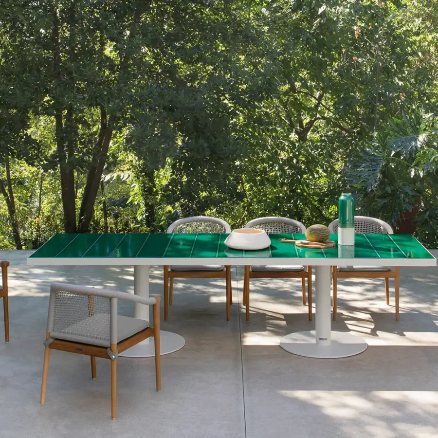 Elegant Atmosphera Pantagruel table with a vibrant green glazed ceramic tabletop and sleek white solid aluminum base