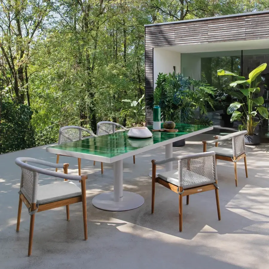 Distinguished Atmosphera Pantagruel table with a deep green textured ceramic tabletop and light neutral solid aluminum base crafted with warm wooden legs