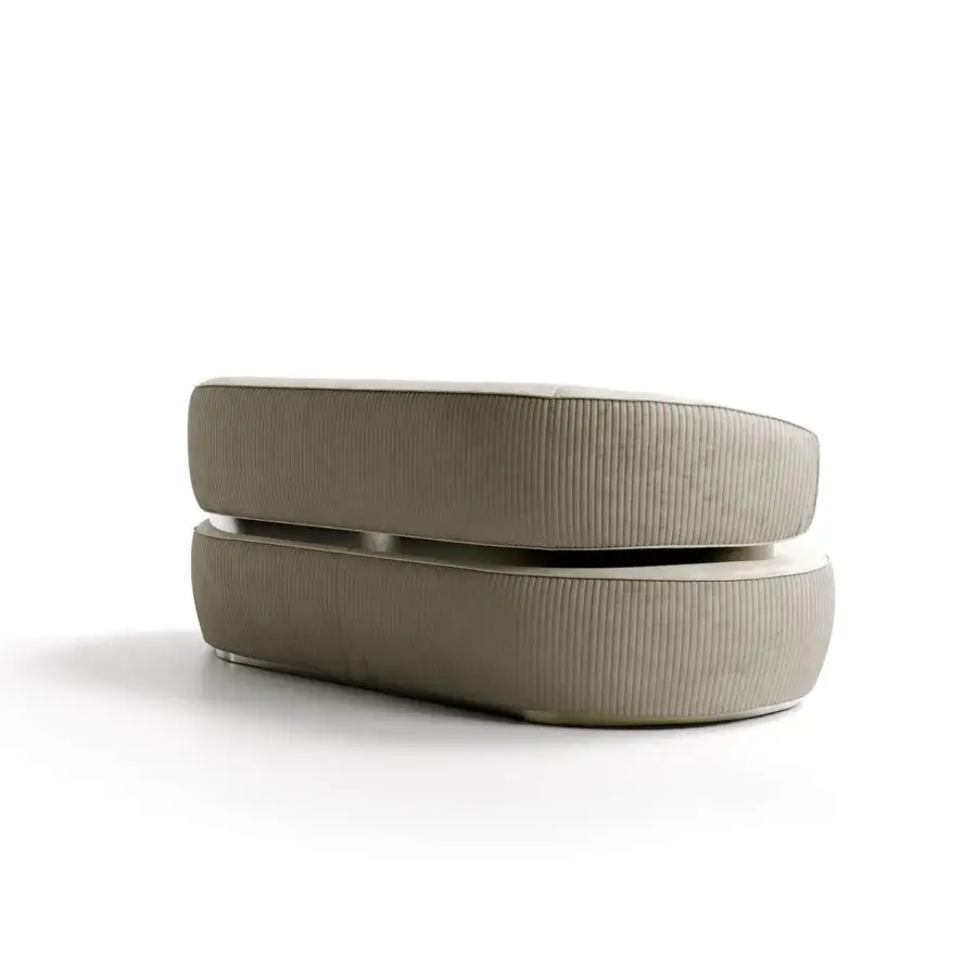 Distinguished Capital Bon Ton sofa with low rounded silhouette upholstered in warm gray textured textile and satin finished metal base