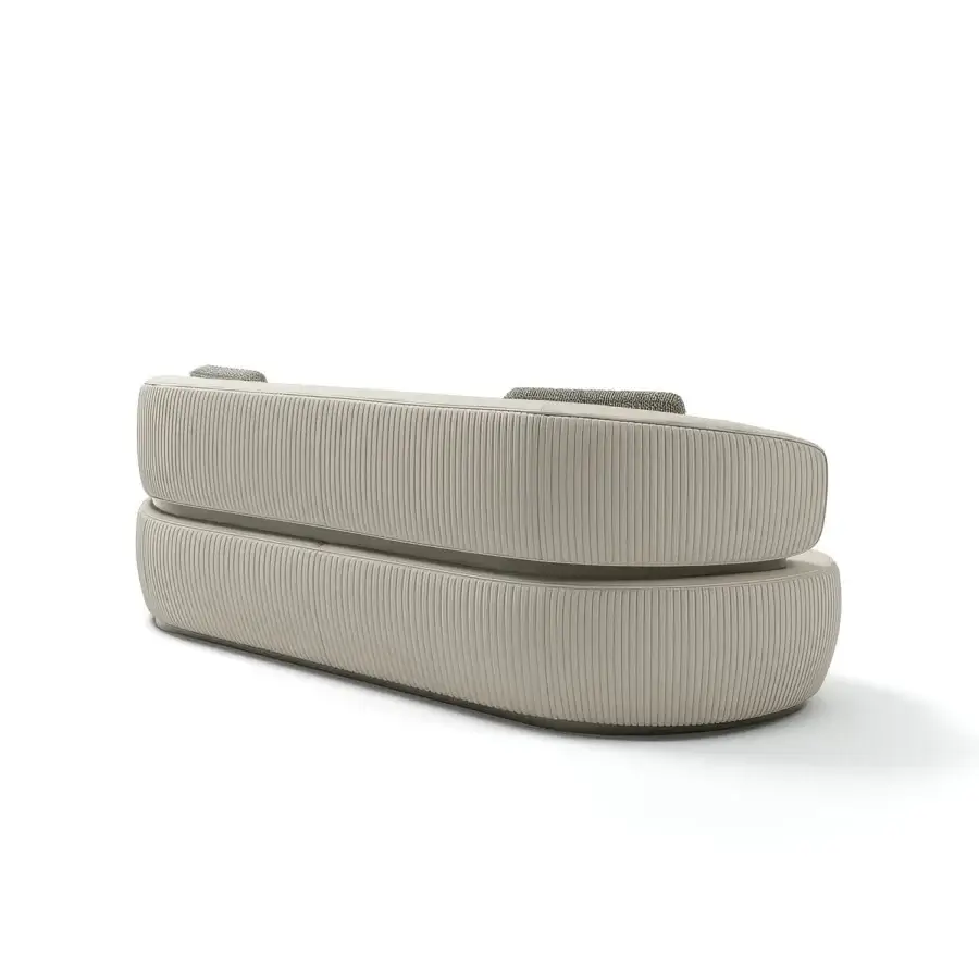 Distinguished Capital Bon Ton sofa with sculpted form upholstered in light neutral textured fabric and sleek metal base crafted with wooden frame