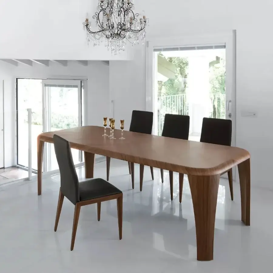 Elegant Ivano Antonello Italia Igor dining table crafted in wood veneer with a satin finish and gently curved edges