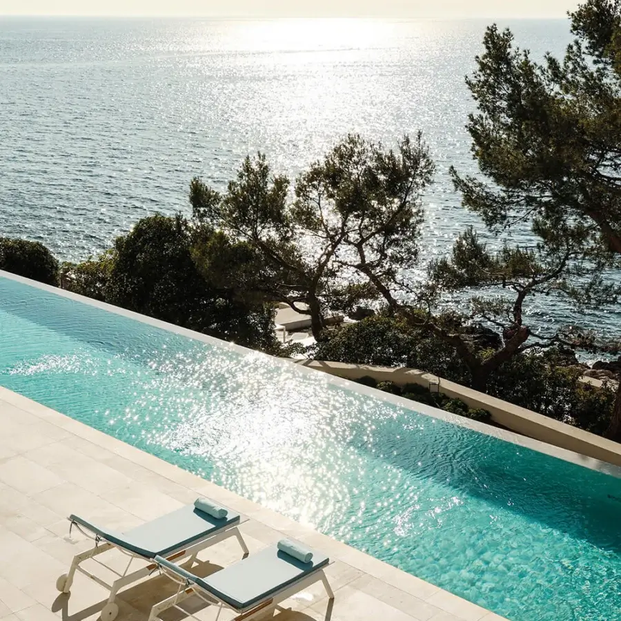 Distinguished Atmosphera Nevada chaise lounge with graphite aluminum, warm teak and muted blue cushions