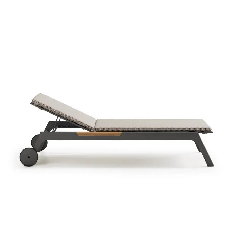 Elegant Atmosphera Nevada chaise lounge crafted with graphite aluminum, warm teak and woven detailing