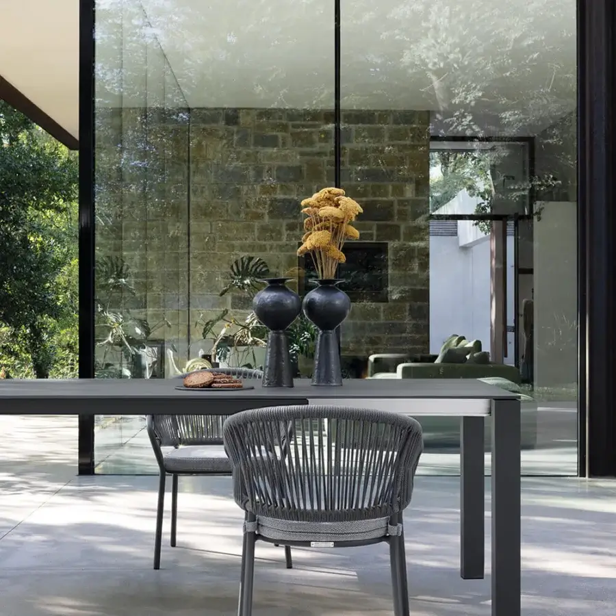 Distinguished Atmosphera Pleasure armchair with sculpted aluminum, woven rope and matte dark gray finish