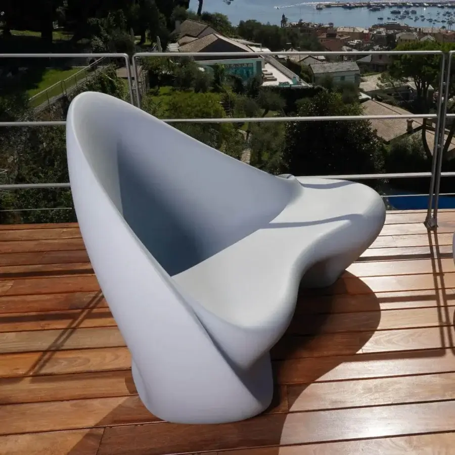 Exceptional Serralunga Ripple sofa sculpted from cool white lacquered LLDPE offering a flowing wave-like form for all-weather use