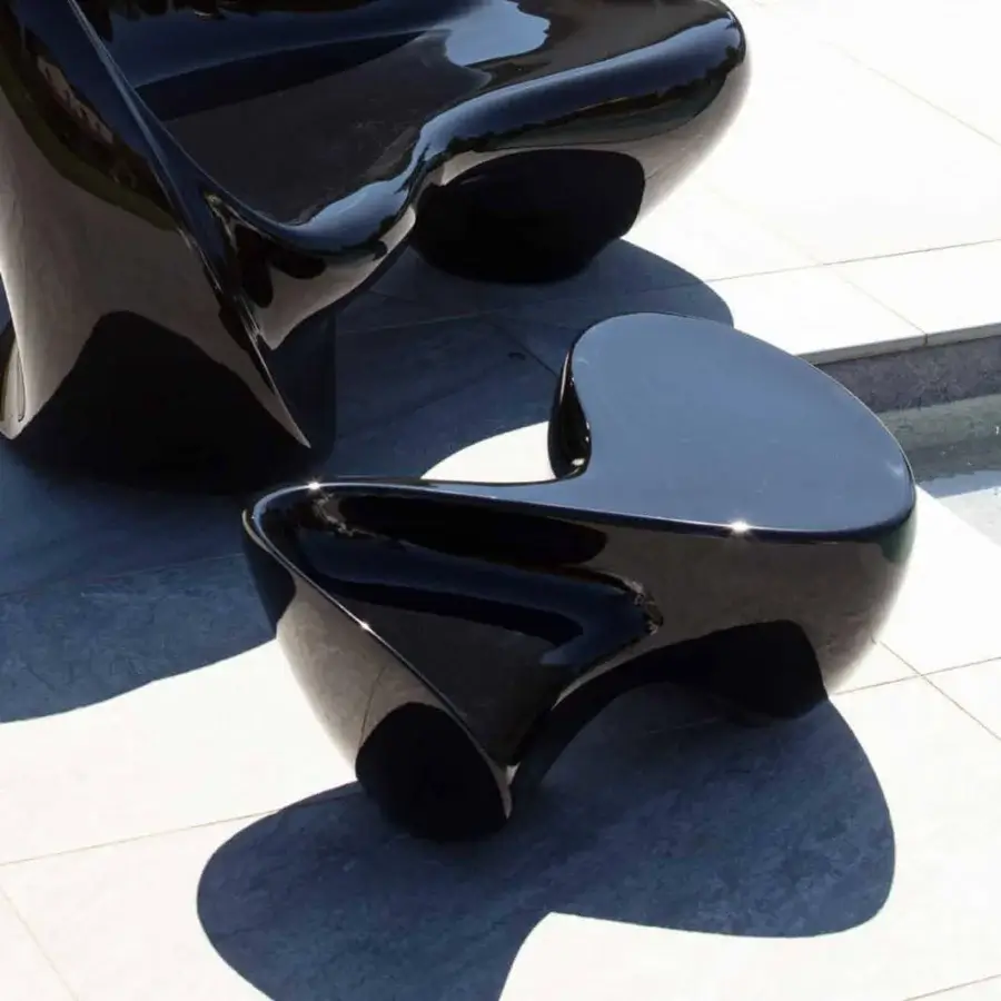 Captivating Serralunga Ripple coffee table with sculptural form crafted in glossy black lacquered LLDPE