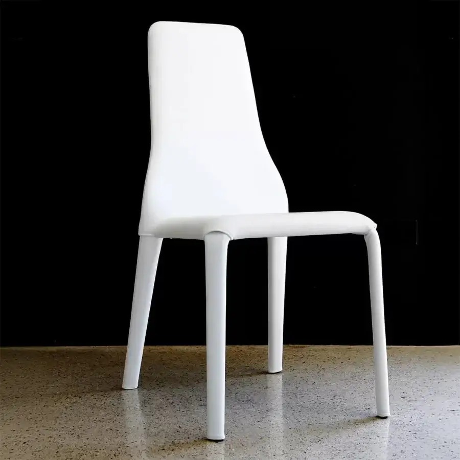 Superior Ivano Antonello Italia Olivia dining chair in uniformly white eco-leather with a sleek, curved backrest design