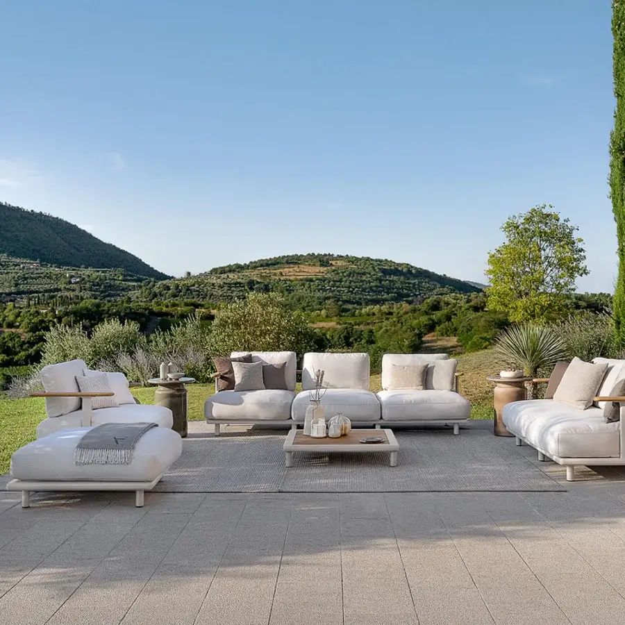 Exceptional Atmosphera Bliss lounge chair crafted with aluminum in Gesso finish and natural teak armrests with off-white textile upholstery