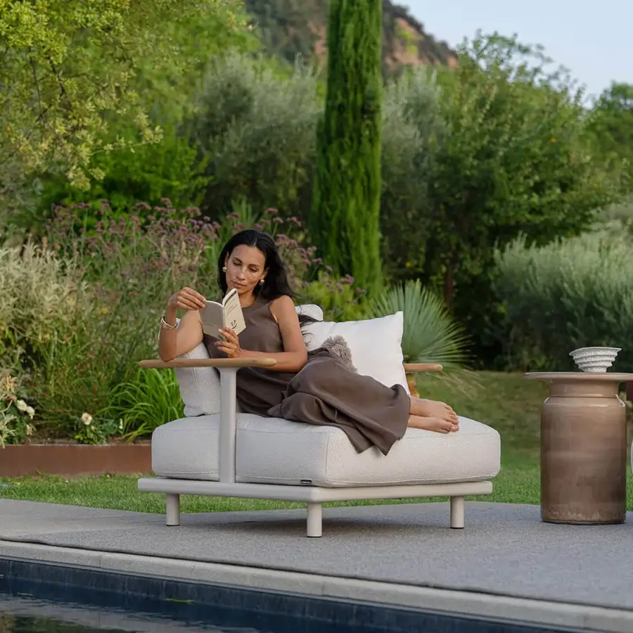Elegant Atmosphera Bliss lounge chair with aluminum in Gesso finish and light neutral beige high-performance outdoor upholstery
