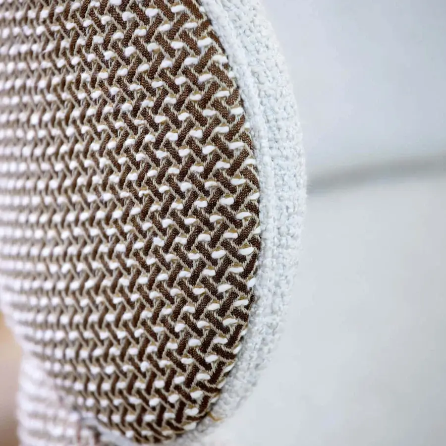 Elegant Capital Dafne armchair with woven textile alternating off-white and rich brown tones, built with a solid wooden frame