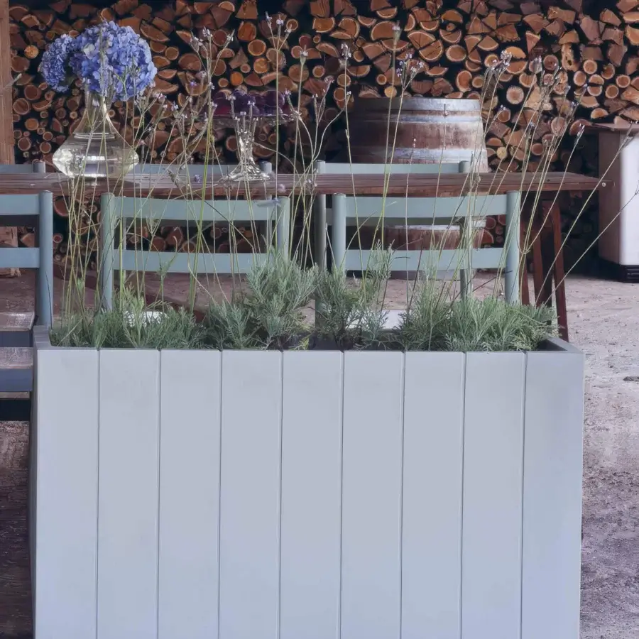 Distinguished Serralunga Fence planter, a planter crafted in light gray LLDPE plastic with a subtly textured matte finish
