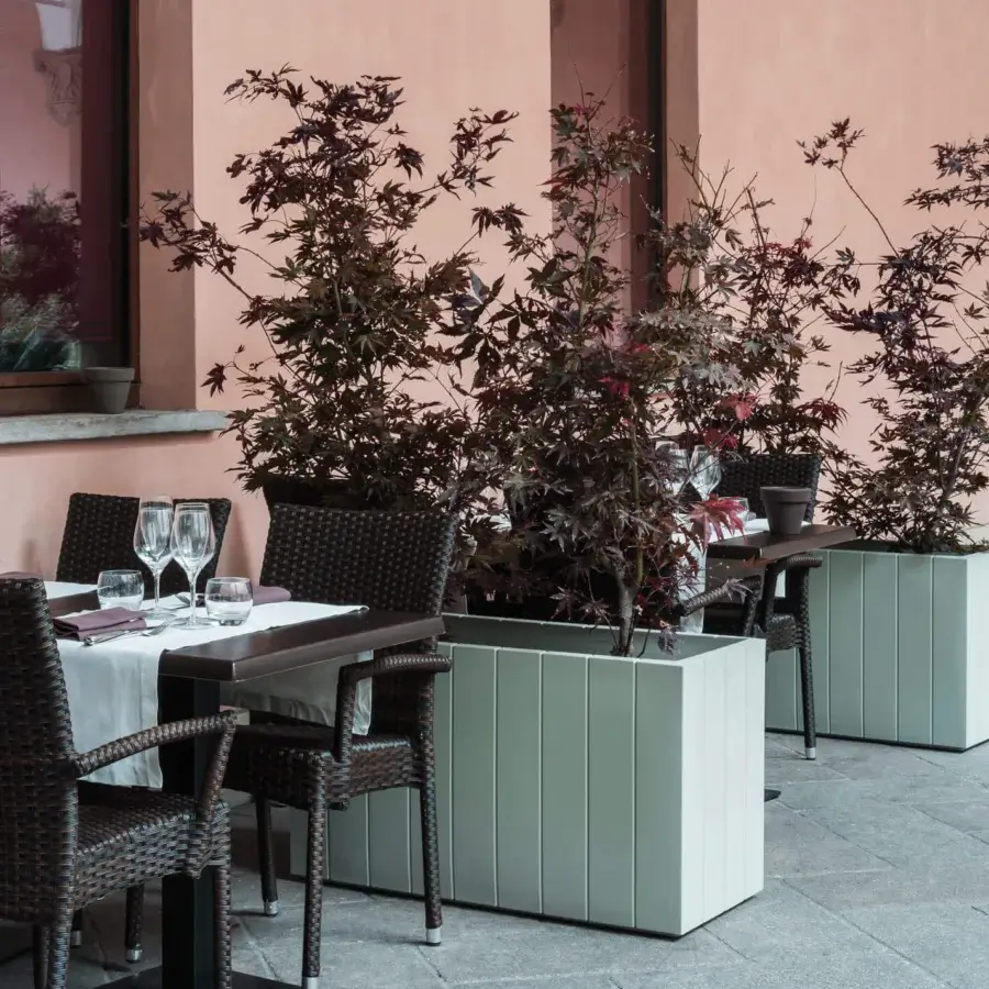 Exceptional Serralunga Fence planter, a planter crafted in light grey recyclable LLDPE with a subtly textured matte finish