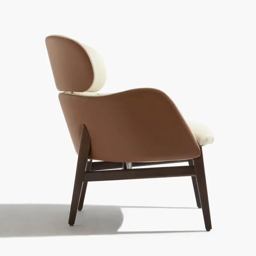 Superior Capital Dafne lounge chair with curved design upholstered in warm brown textile and dark satin-finish wooden legs