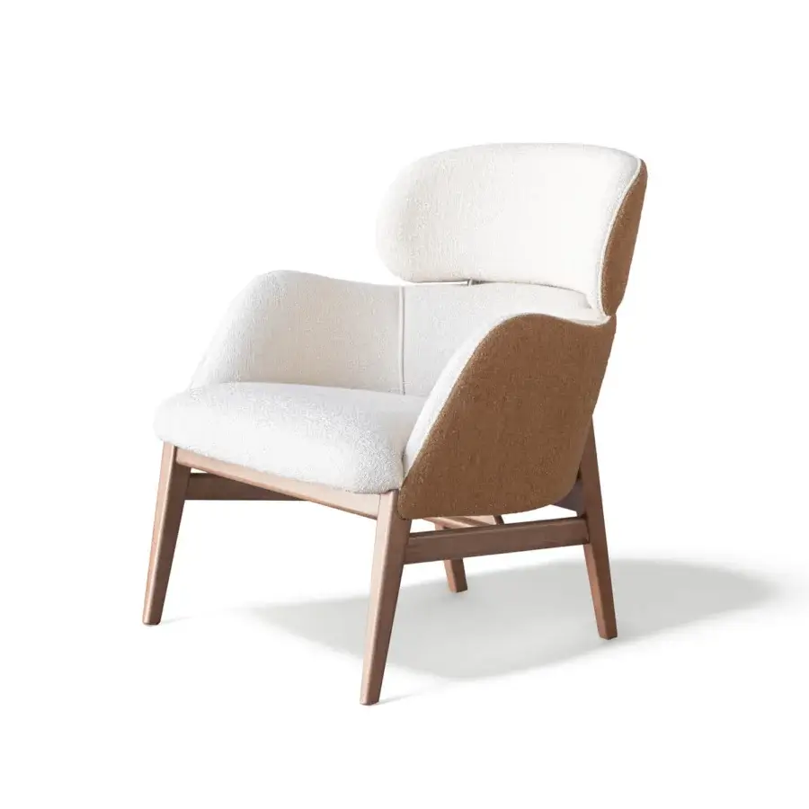 Distinguished Capital Dafne lounge chair with enveloping form upholstered in textured off-white bouclé fabric and satin finished wooden legs
