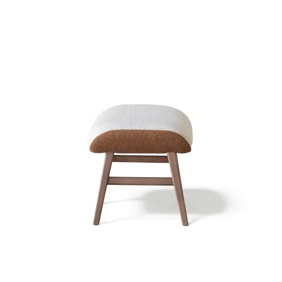 Elegant Capital Dafne lounge chair with enveloping form crafted in wood and two-tone textile upholstery with satin finish