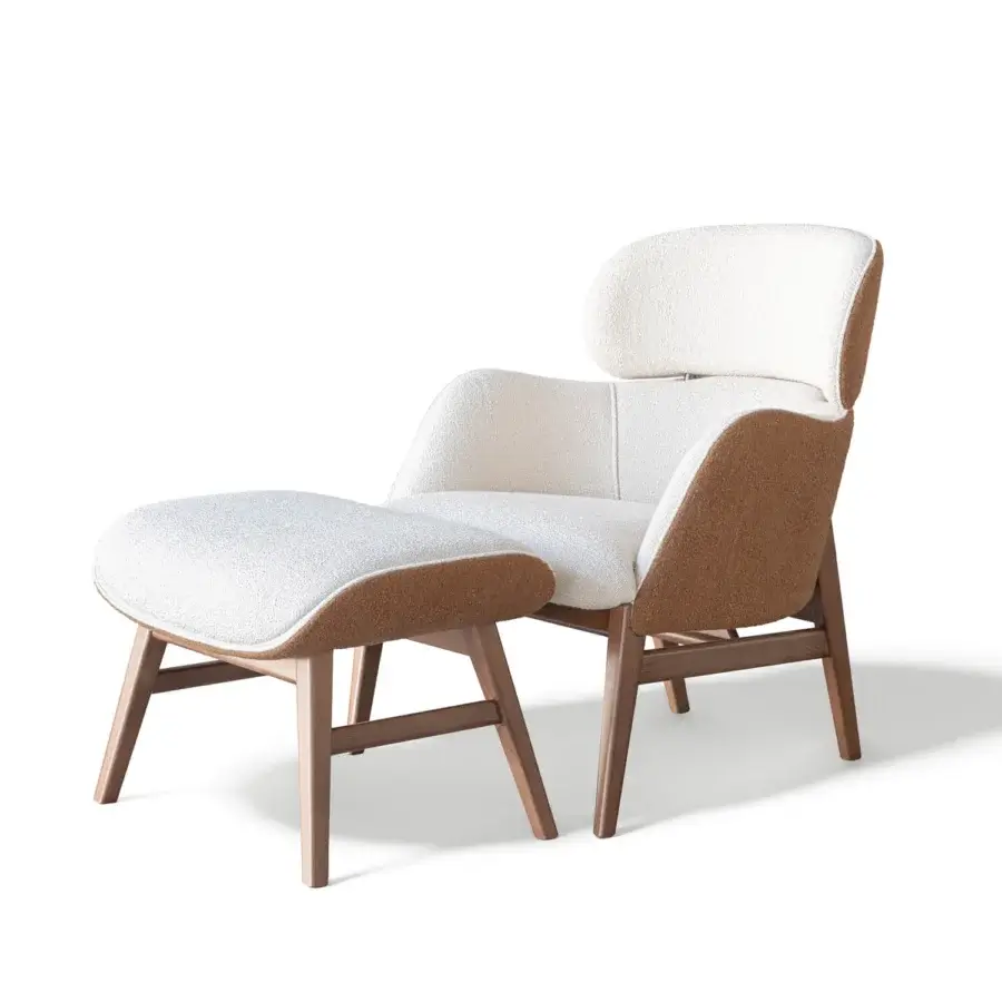 Exceptional Capital Dafne lounge chair with curved design upholstered in textured cream textile and satin-finish wooden legs
