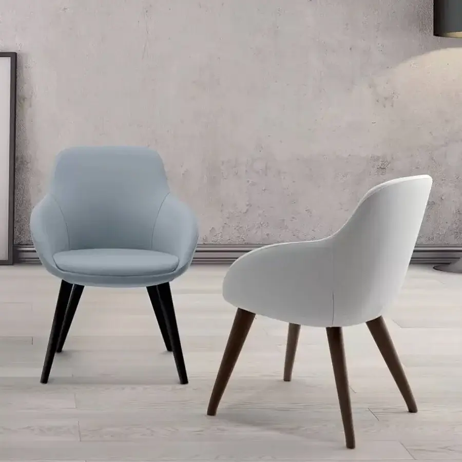 Elegant Ivano Antonello Italia Simona armchair with rounded silhouette upholstered in light blue textile and beech wood base