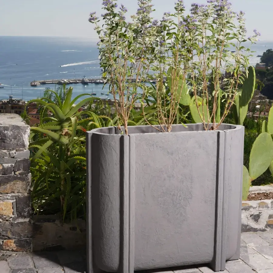 Exclusive Serralunga Cassero planter with concrete-effect finish crafted in durable muted gray recyclable LLDPE plastic