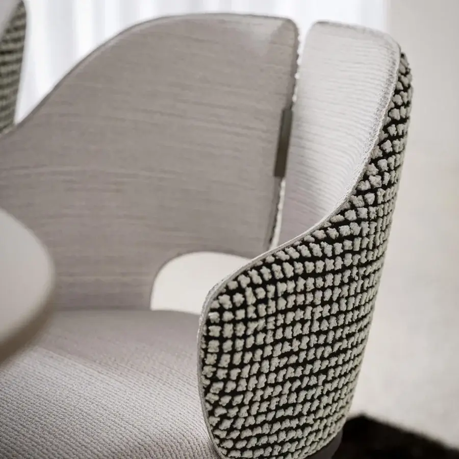Distinguished Capital Augusta armchair with tactile neutral beige textile upholstery and dark finished wooden legs