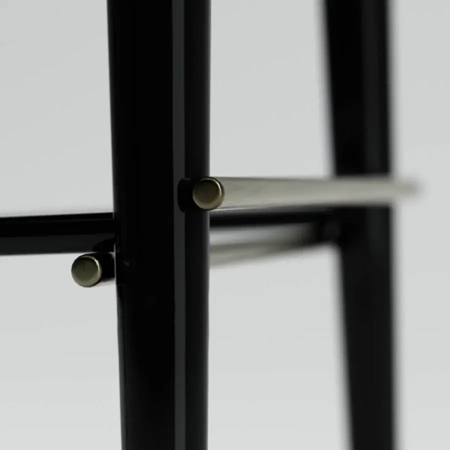 Superior Capital Augusta stool crafted with matte black metal, brushed gold connectors, and curated high-end fabric upholstery