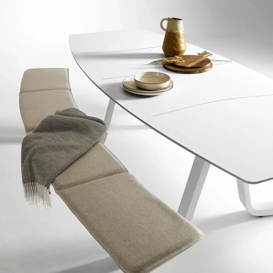 Sophisticated Atmosphera 8Teen table with benches crafted in white synthetic material with matte finish and water-draining millings
