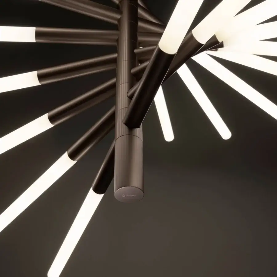 Distinguished Contardi Bianca Twist suspension lamp in steel with a dark bronze-toned satin finish emits diffused light from milky white glass tubes
