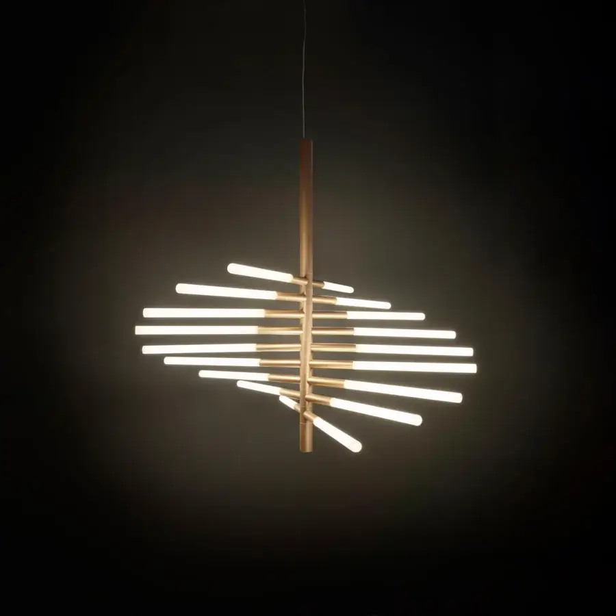 Elegant Contardi Bianca Twist suspension lamp in steel with golden finish creating a sculptural composition and soft diffused light