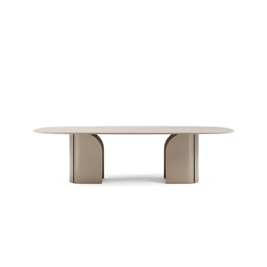 Exceptional Capital Duna table with gently curved matte beige tabletop and luminous metallic profiles built from solid surface material