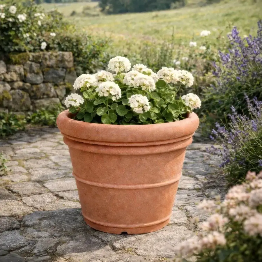 Elegant Serralunga Doppio Bordo planter crafted from recyclable LLDPE with a matte terracotta finish and textured double-rimmed edge