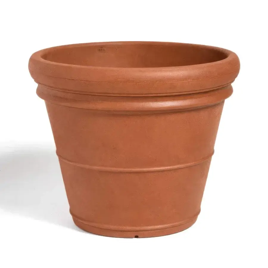 Elegant Serralunga Doppio Bordo planter crafted from recyclable LLDPE with a matte terracotta tone and subtle horizontal ridges