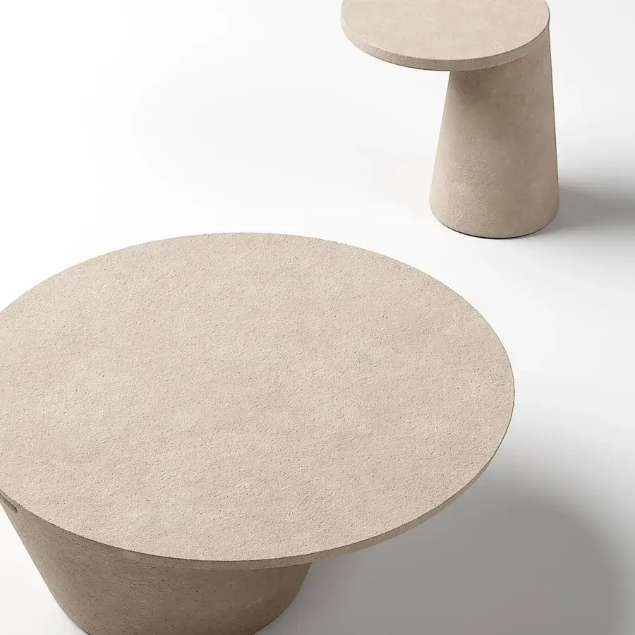 Distinguished Atmosphera Totem coffee table with a bold cylindrical base and circular support in tactile beige concrete