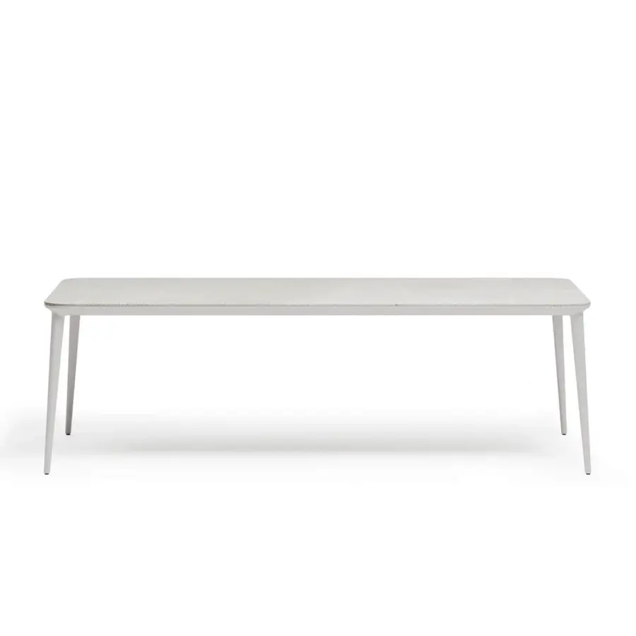 Distinguished Atmosphera Origami table with airy folded form and resilient gres porcelain stoneware in textured gray with matte white aluminum