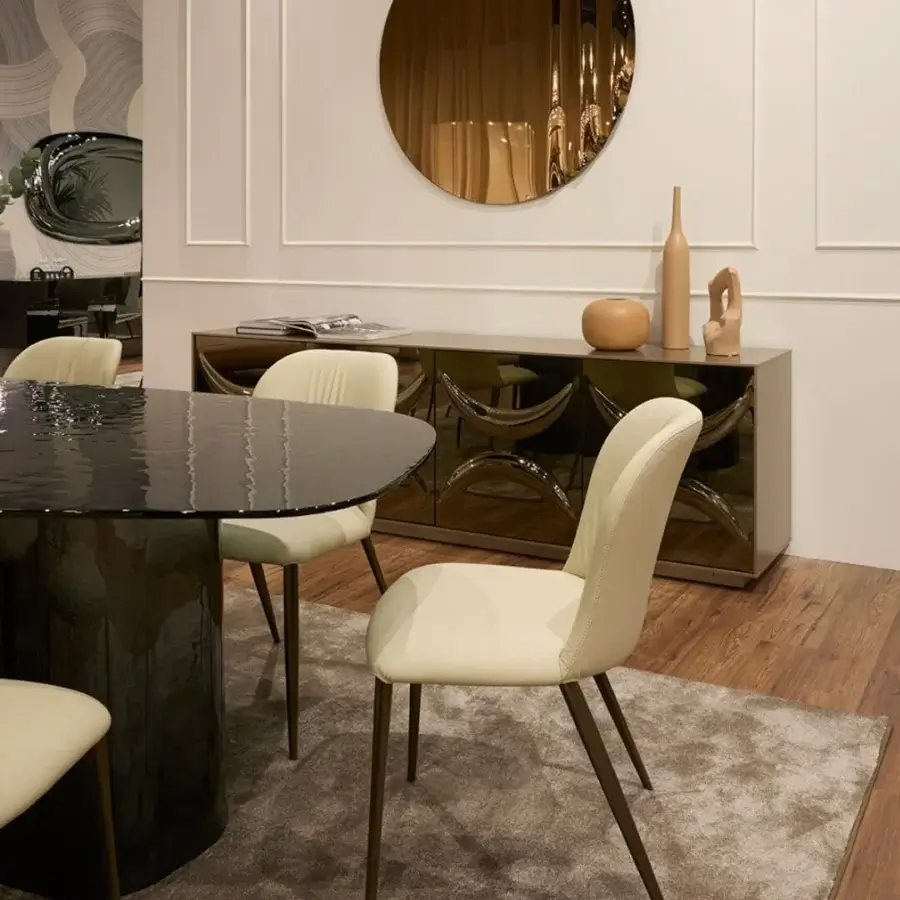 Captivating Tonin Casa Ablos table crafted in dark glossy hammered glass with a dramatically curved tabletop