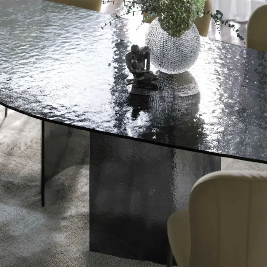 Superior Tonin Casa Ablos table crafted in smoky gray hammered glass with sculpted tabletop and base