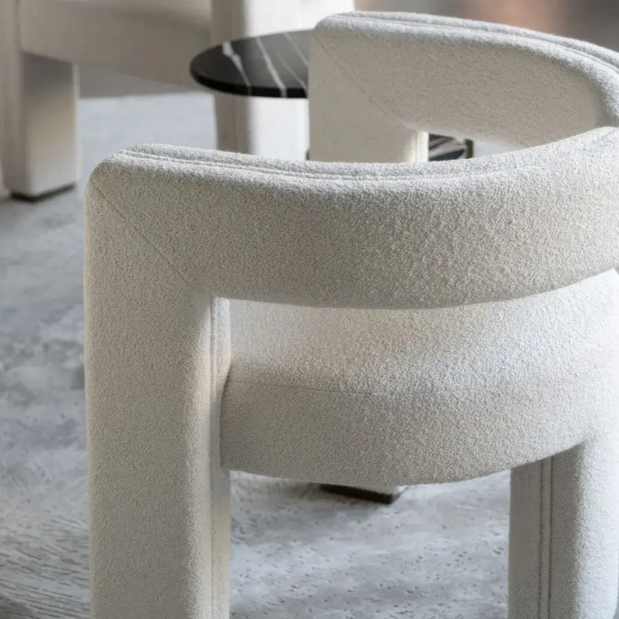 Superior Capital Mirage armchair upholstered in textured light beige fabric with a matte finish and subtle metal details