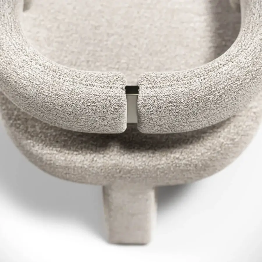 Distinguished Capital Mirage armchair with soft textured beige upholstery and subtle metal finishes crafted in Italy