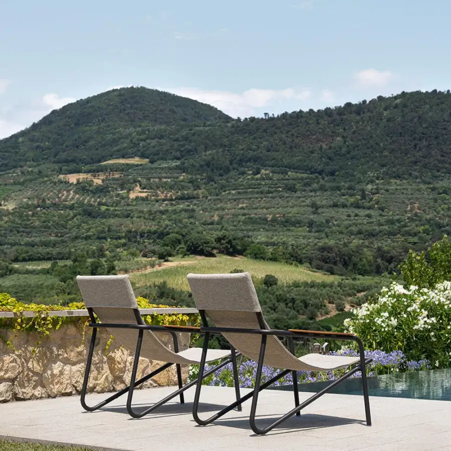 Elegant Atmosphera Zante lounge chair crafted with a dark gray aluminum frame and breathable textilene seat and backrest