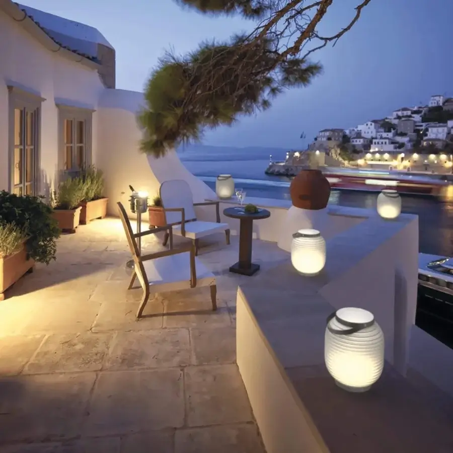 Distinguished Serralunga Honey Lantern, portable lighting crafted in creamy white translucent LLDPE with a leather handle