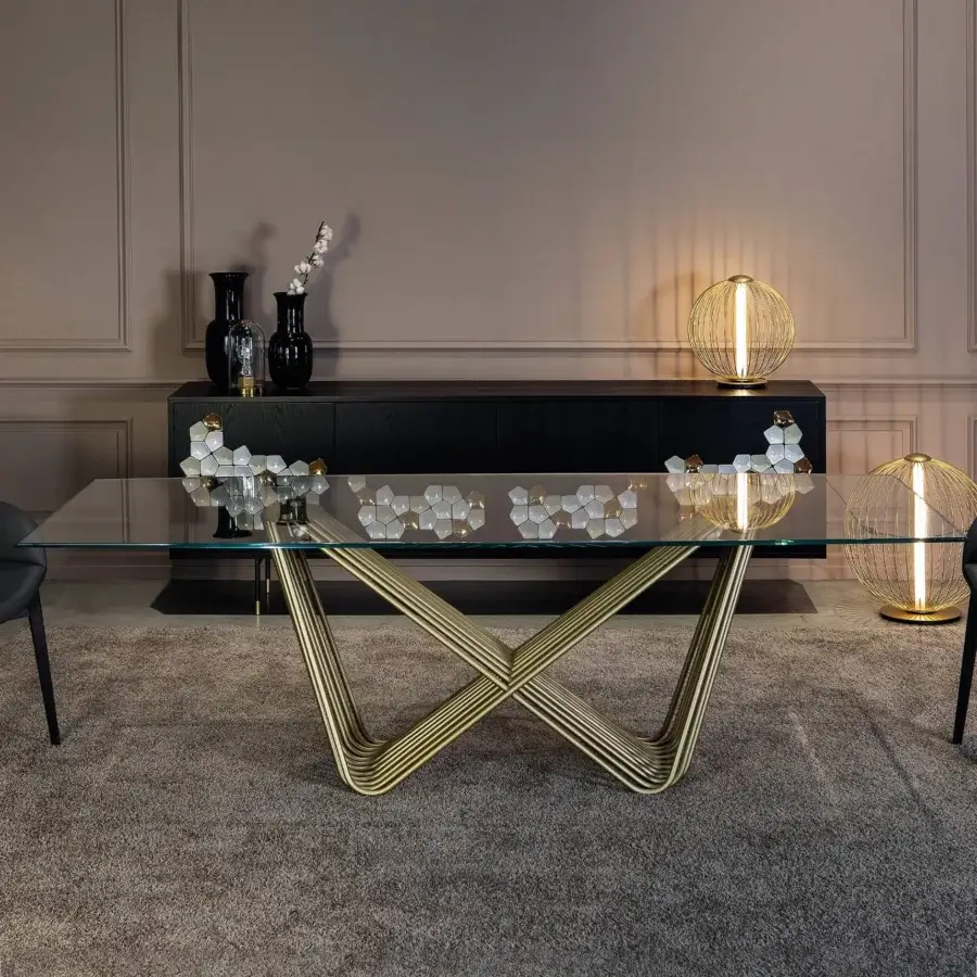 Exceptional Tonin Casa Tenso table crafted with rectangular tempered glass and a satin golden painted steel base